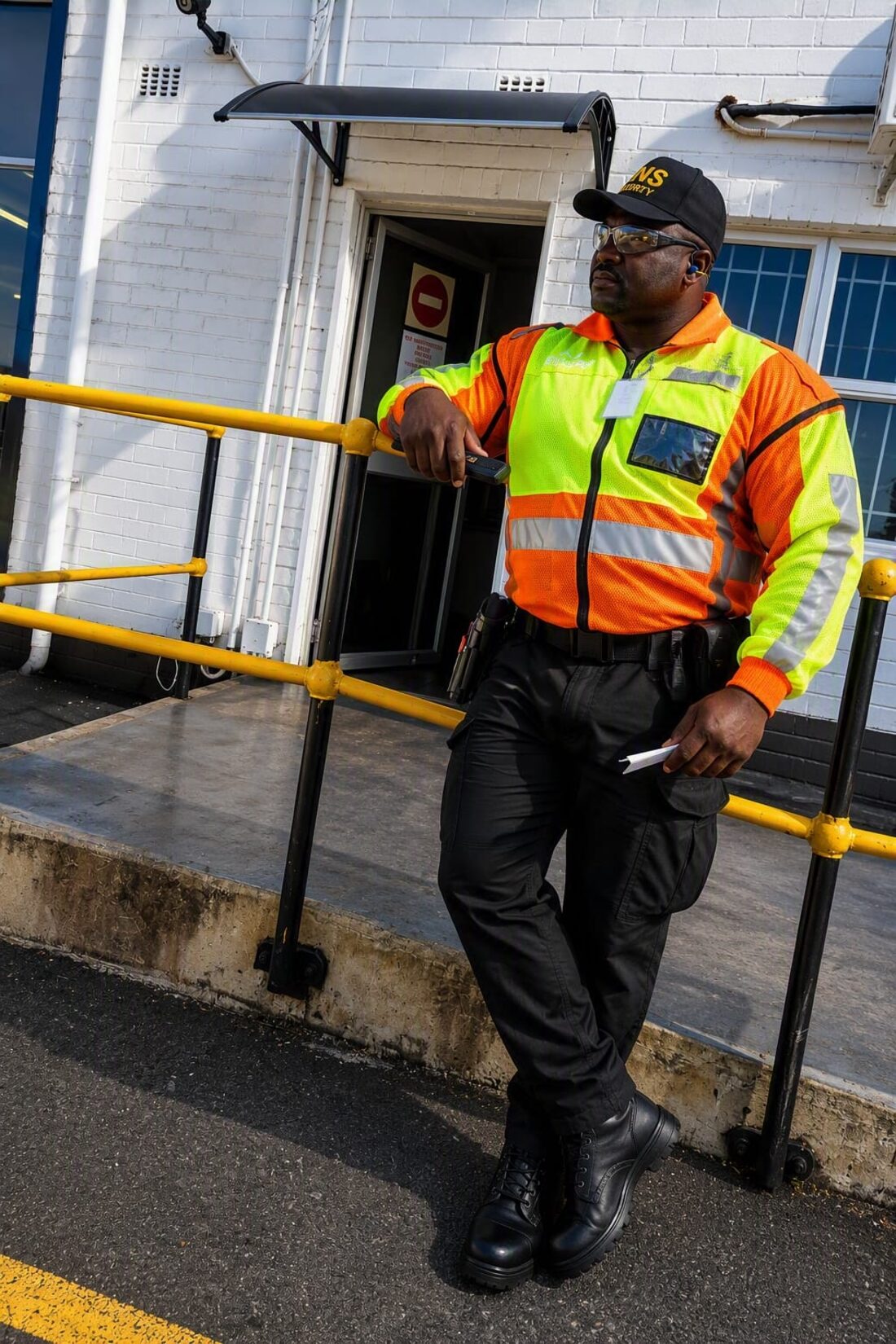 NS Security officer conducting access screening at a client site