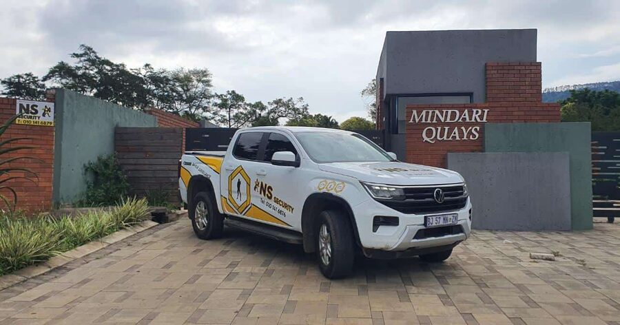 NS Security branded vehicle at a residential estate entrance